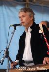 photo of David Massengill singing at the microphone