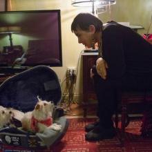 Bonnie Koloc with two dogs