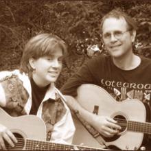 photo of Peter and Annie with their guitars