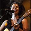 Heather Aubrey Lloyd playing guitar